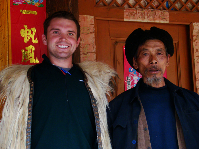 student clerk adam norberg wearing Naxi farmer garment